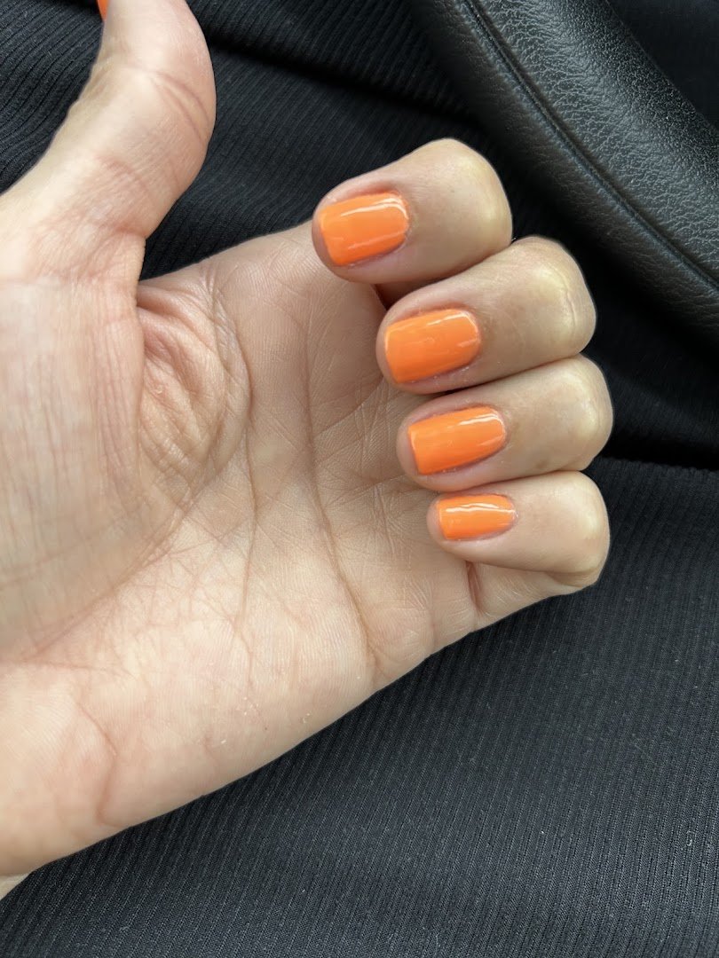 Polished nails displayed on a hand
